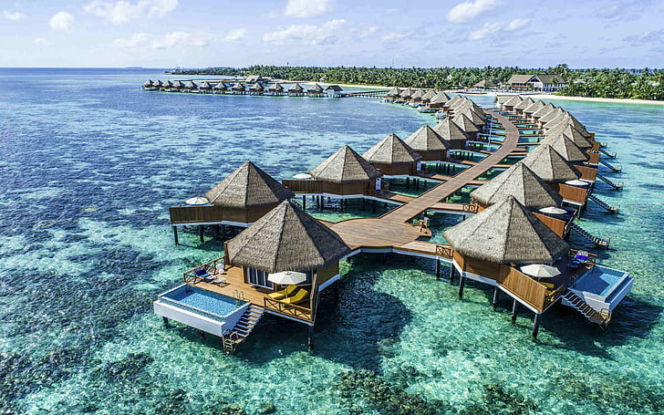 Tropical blue seascape and calm water for luxury island travel inspiration